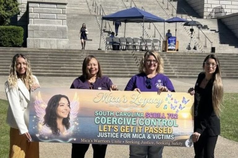 Four women hold a 'Mica's Legacy — SC Bill 702, Coercive Control' banner on the South Carolina State House steps