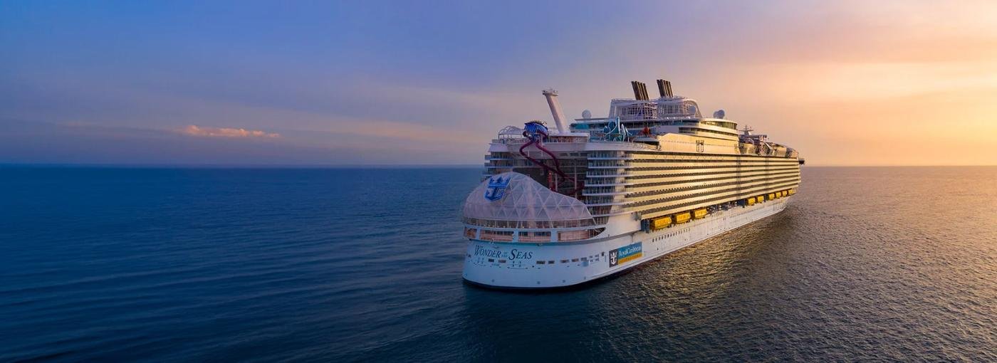 Royal Caribbean’s Wonder of the Seas at sea at sunset